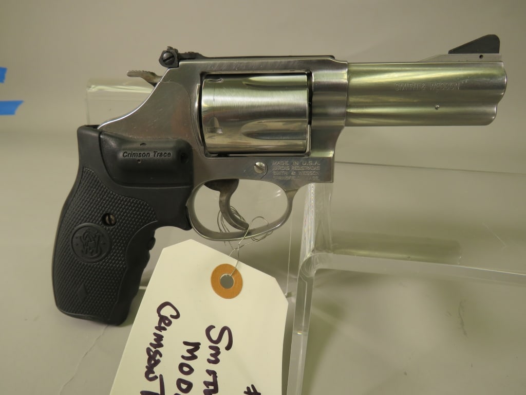 Smith & Wesson Model 60-15 .357 Magnum Revolver: 5-Round Cylinder/ Installed Crimson Trace Grip Laser. Holster Included. SN:CNH9442 By bidding on this lot buyer accepts responsibility of knowledge of State and Federal laws for their states requireme