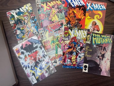 (9) X-Men Comics