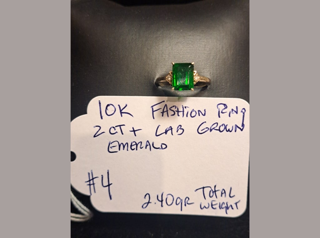 10K Ring w/ Lab Emerald: 10K fashion ring with 2 ct lab-grown emerald, total weight 2.40 grams.