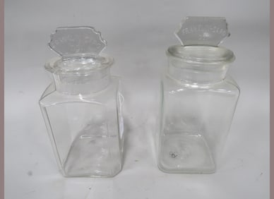 (2) Franklin-Caro Embossed Store Jars