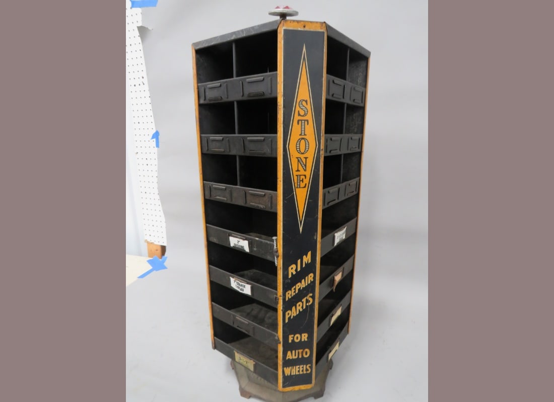 Stone Rim Repair Parts Store Bin: 4-Sided Swivel Bin complete with some product. 32" x 12"