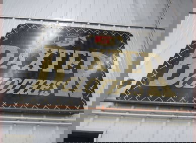 1957 Baxter Clothes Metal Framed Sign