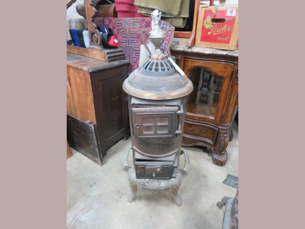 Home Fire 15-237 Circular Parlor stove: 49 x 19 good cond. Mackinac Island State Museum