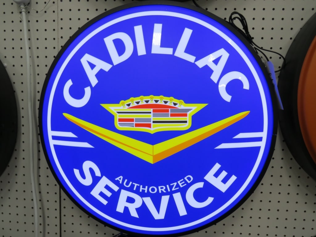 24 inch LED Cadillac Authorized Service Dealer Sig: New Condition w/ Working Light