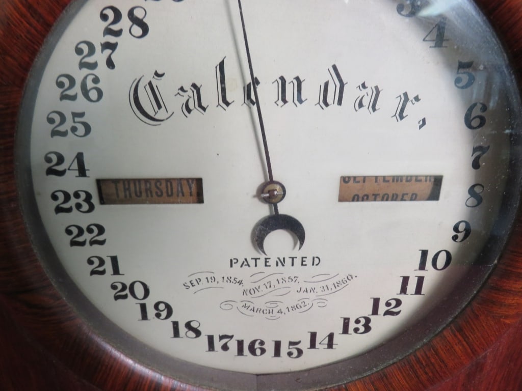 Seth ThomasWalnut Calendar Weighted Shelf Clock - 6