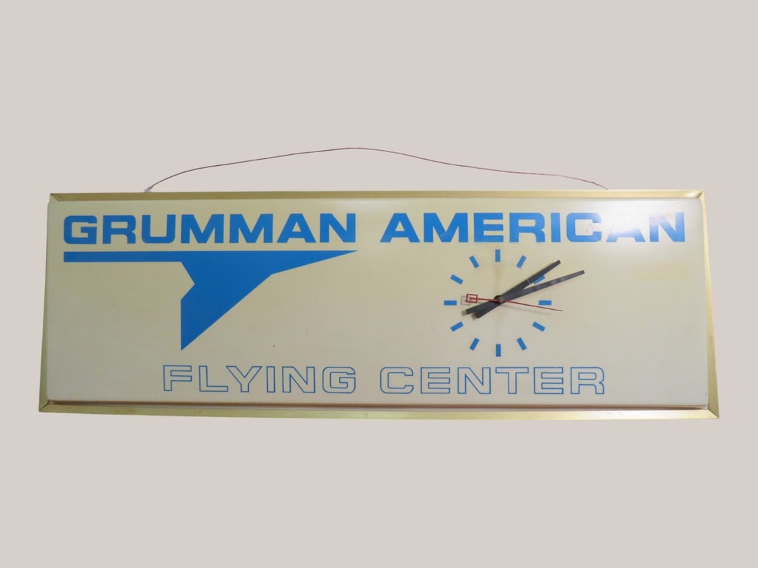 Grumman American Flying Center Advertising Clock: Working Clock/Needs bulb 12 x 36 x 4