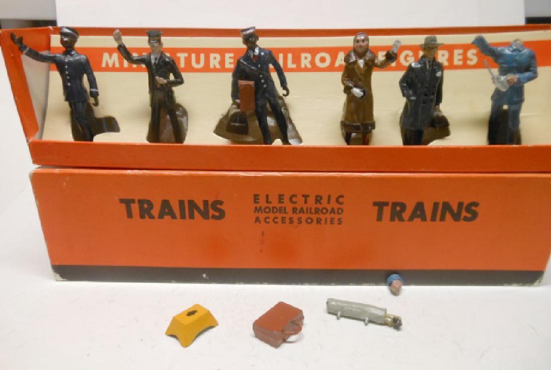 Lionel Reproduction Hill Railway People: Post War reproductions of Pre War items. And a reproduction box. 9 pieces. (one man's head detached but present) Condition very good otherwise. Box excellent.