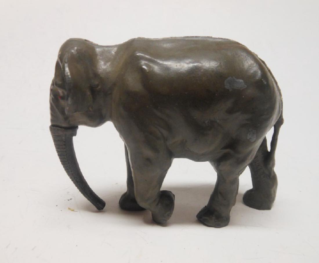 Britains Very RARE Rubber Trunked Elephant: Pre War only. Very short production run, as rubber trunks perished in short time. It is assumed that catalogue 901 was designated to this elephant. One piece. Condition very good. Condition of trunk e