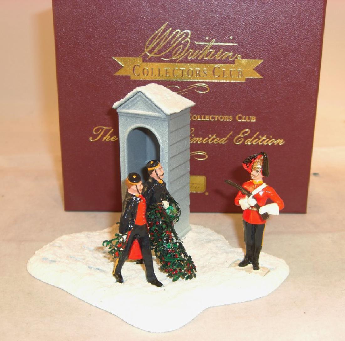 Britains Collectors Club #40173 Winter Limited: #40173 Winter Limited Edition 2002, "Bringing Home the Holly"; no. 217 of 300; 7 pieces (base, 3 holly pieces, 3 figures); excellent in excellent box