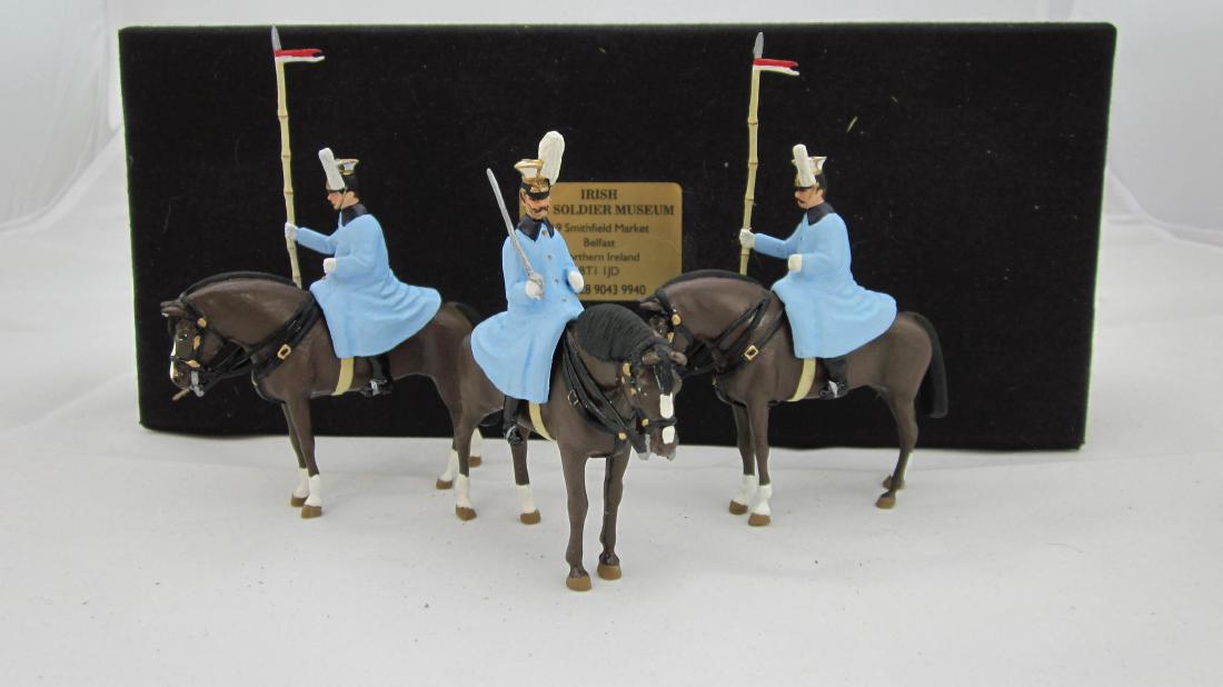 Irish Toy Soldier Museum 21st Lancers in Cloaks: 21st Lancers in Winter Cloaks. 3 pieces. Condition Mint in excellent box