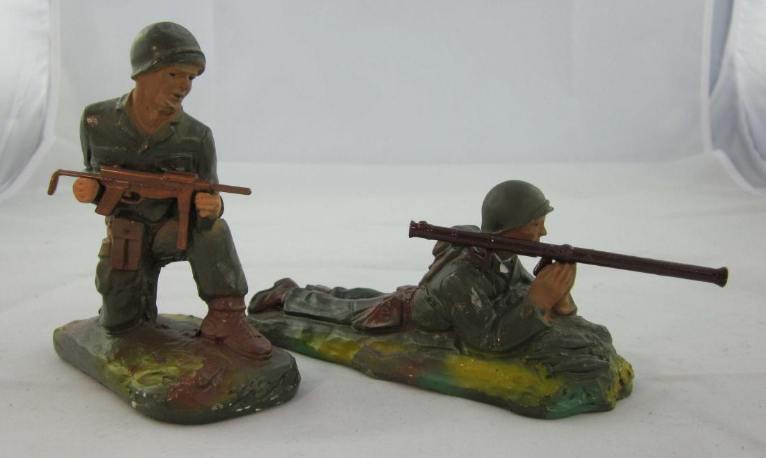 J.H Miller Plaster WWII/Korean War U.S. Soldiers: Miller GIs, #M9 soldier kneeling with machine gun & M9 prone with bazooka (head mended at neck). 2 pieces. Condition very good, replaced metal bazooka