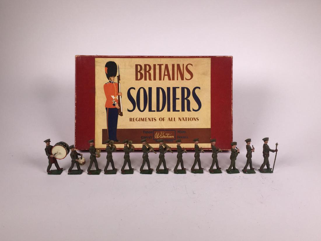 Britains Set #1301 US Military Band: Post War. In original box with replacement tie card. 13 Pieces. Condition Figures Excellent. Condition Box Excellent.
