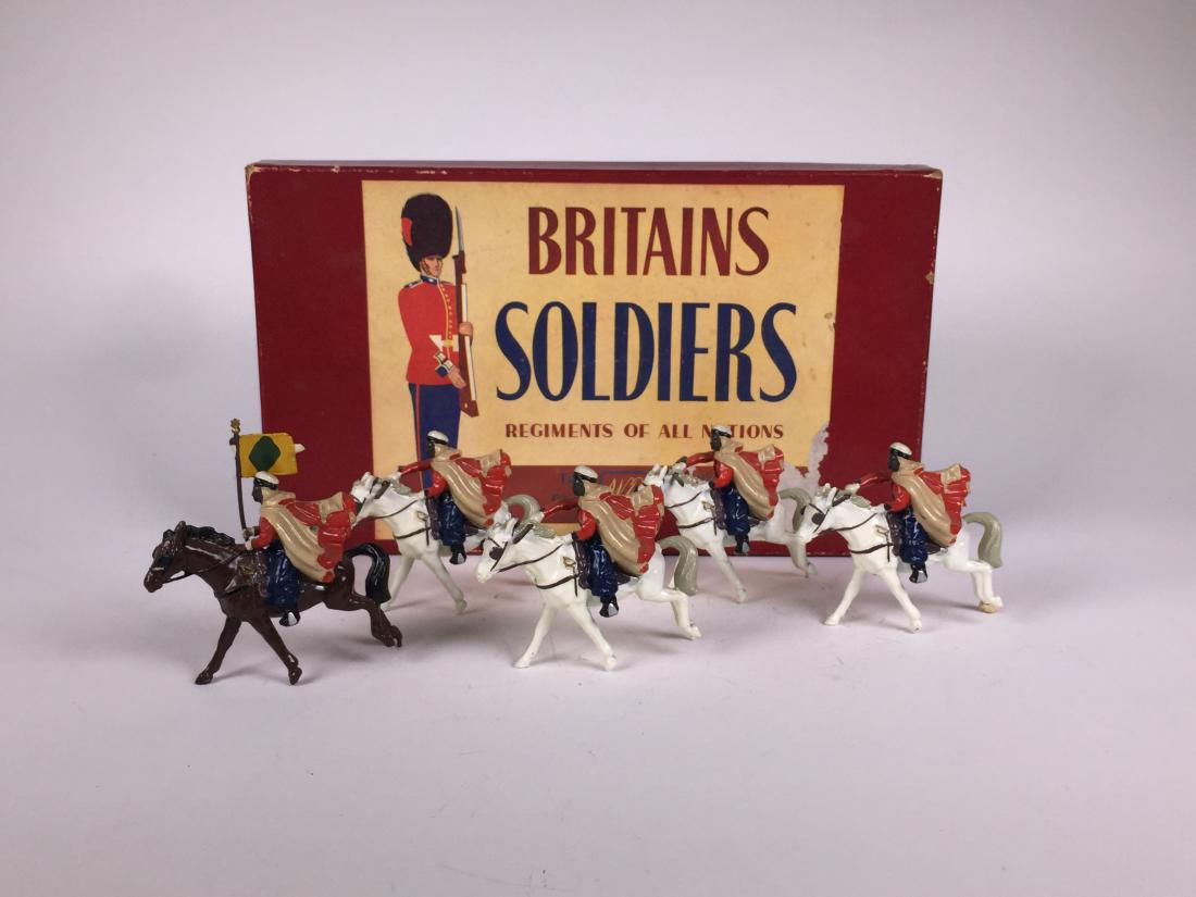 Britains Set #2172 Algerian Spahi's: Post War. In original ROAN box with original packing and tie cards. 5 Pieces. Condition Figures Excellent; One rifle butt detached, but present. Condition Box Good.