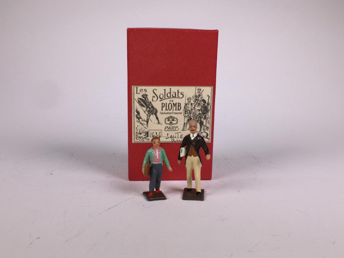 Mignot Man and Boy: Post War. In original box. 2 Pieces. Condition Figures Excellent. Condition Box Excellent.
