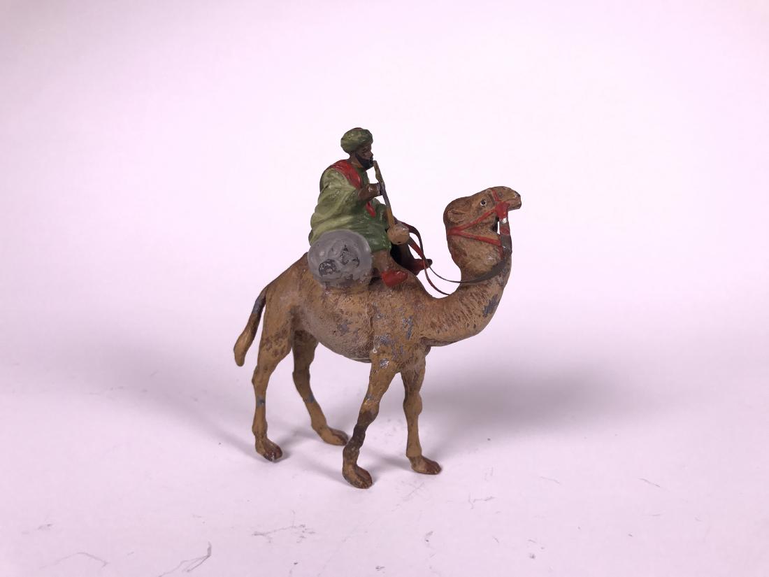Heyde Arab on Camel smoking long pipe (1 of 1)
