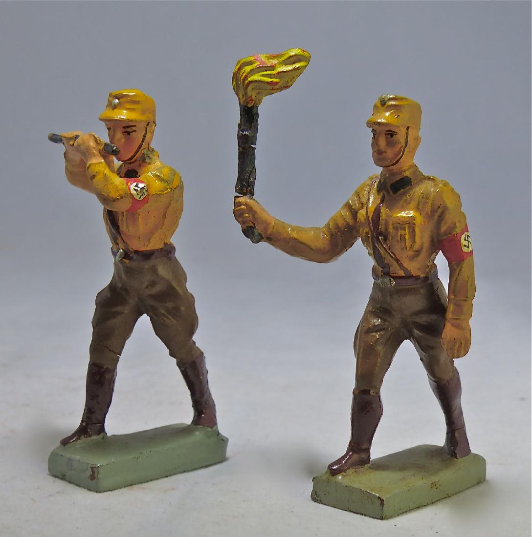 Lineol 2 SA with Torch Play Flute: Couple of thin cracks with just light wear. Excellent faces, paint quality and original complete arm bands. 7.5 cm. Made ONLY 1933-36. Excellent.