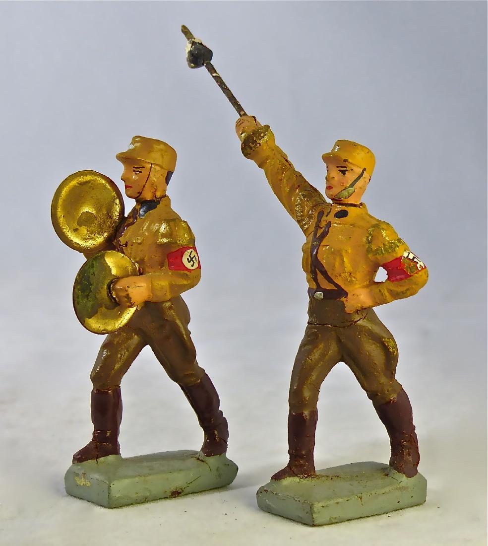 Lineol 2 SA Musicians Cymbals Tambour Major: 2 Thin neck cracks with just some light wear and some chips to one arm band.. Excellent faces, paint quality and original arm bands. 7.5 cm. Made ONLY 1933-36. Excellent.