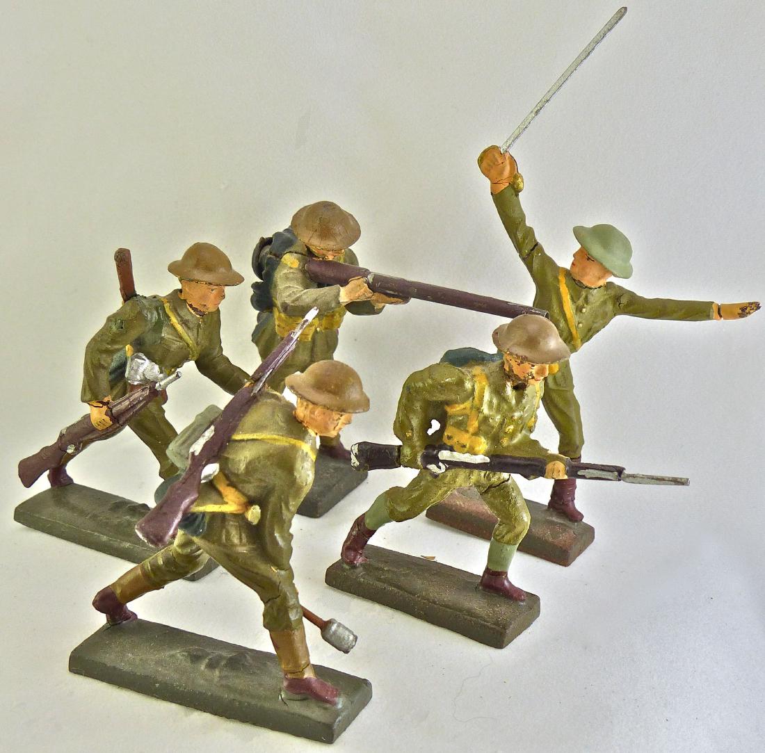 Lineol 5 US Combat Soldiers: Few minor cracks and some light wear. Sign of repair to soldier with shovel on back. Soldier standing with rifle has pack that pulls back and fires caps. 5 pieces. 7.5 cm. Office and soldier charging 