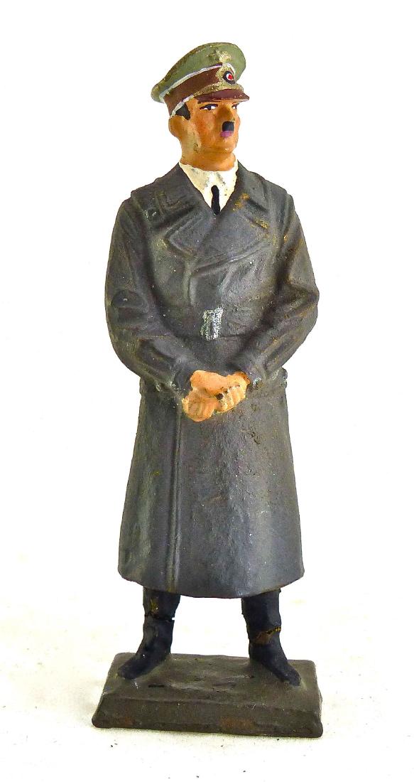 Lineol Hitler Stand in Leather Coat ONLY 1938-39: Couple of thin ankle cracks with hardly any wear. Excellent face and paint quality. Excellent likeness and coat/ hat detail. 1 Piece. 7.5 cm. Made ONLY 1938-39. Excellent.