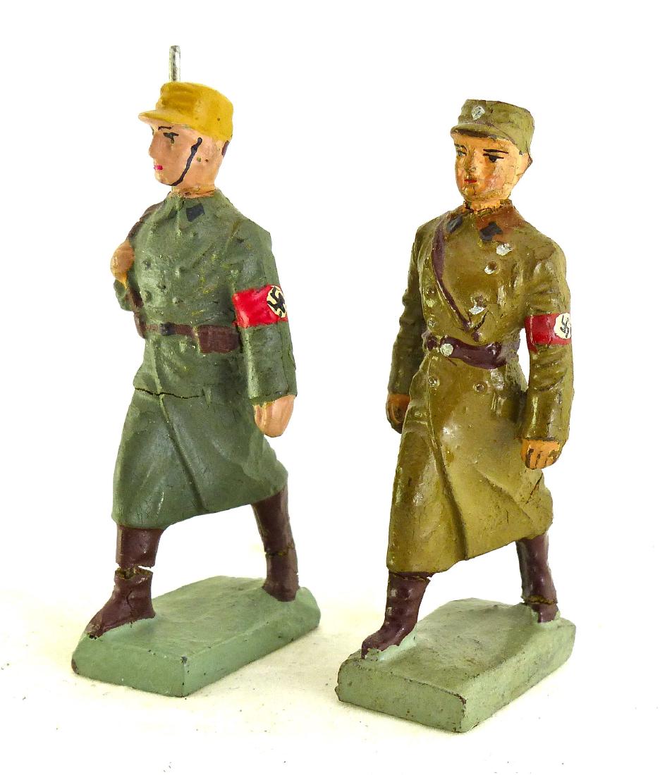 Lineol 2 SA Winter Coats 1 with Rifle: Very scarce political figures. Man in green coat has some touch-up to face and armband. Paint quality very good. Brown winter coat has no cracks and hardly any wear. Face, paint quality and armband al