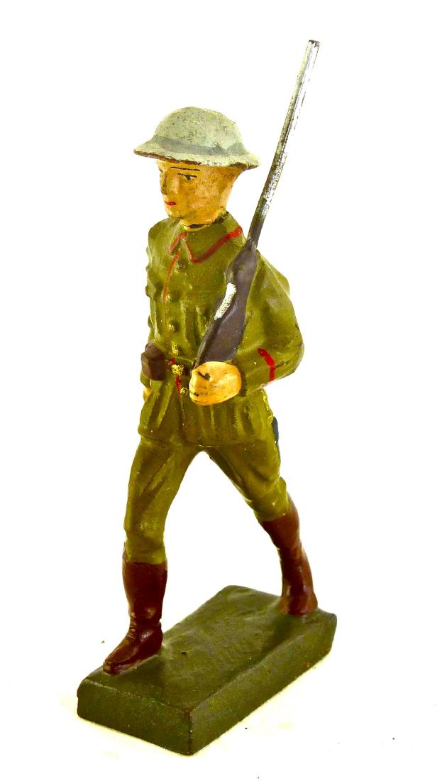 Lineol Very Scarce Cuban Soldier with Rifle: No cracks or apparent wear. Has the distinctive gray circle around helmet top just in from edge of the rim. 1 piece. 7.5 cm. Made about 1935-39. Excellent Plus.