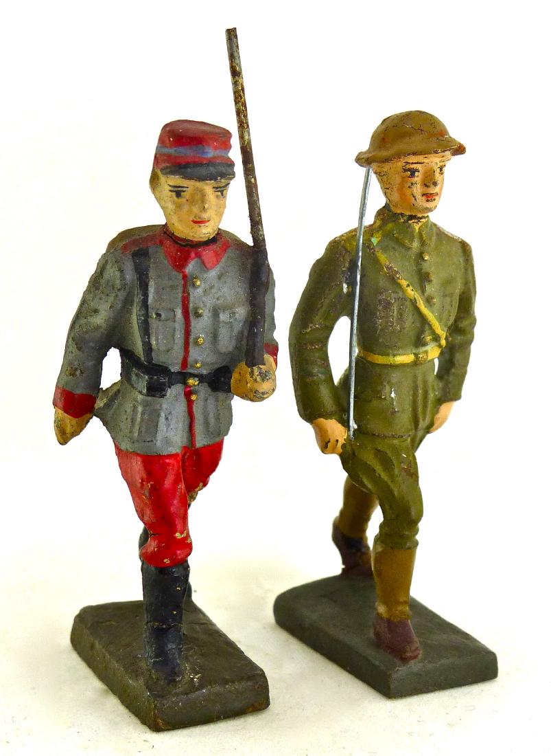 Lineol Scarce 2 Brazilian Soldiers: Few minor cracks with just some light wear. Officer with nick from helmet. Both faces and paint quality are excellent. Soldier in gray/ blue top and red pants wears their parade uniform. 2 Pieces. 7.5