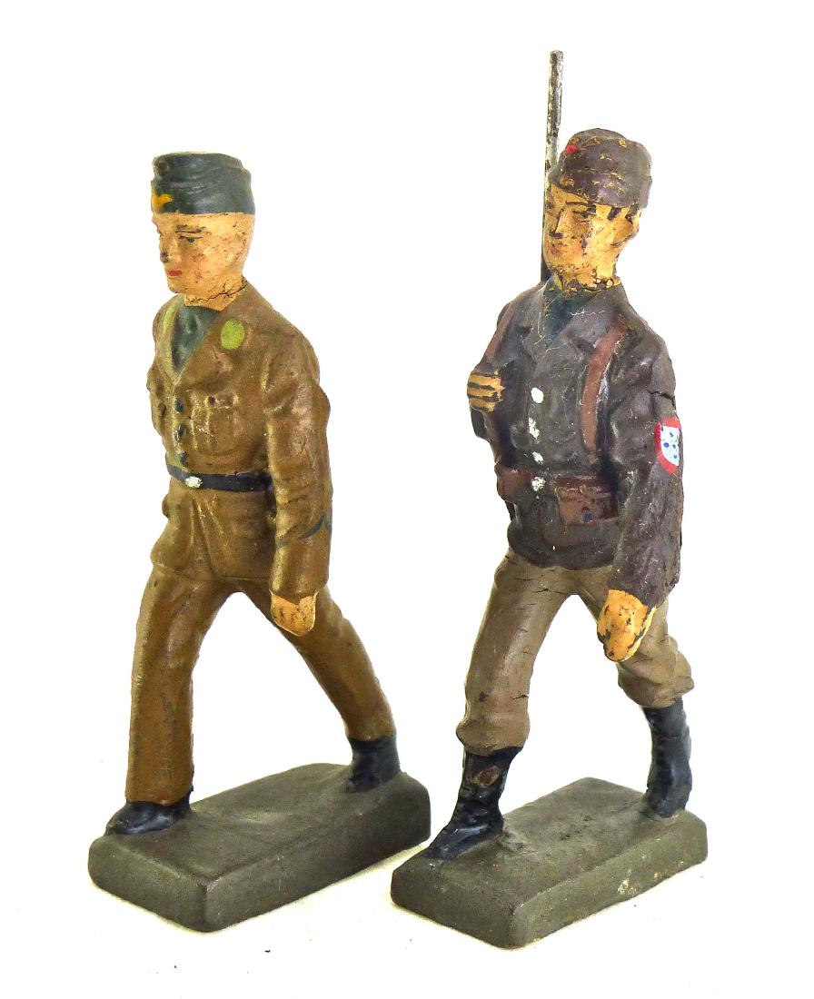 Lineol 2 Portuguese Soldiers 1 Legion 1 Cadet: 1 thin neck crack with just some light wear. Legion figure has no apparent wear with excellent face, paint quality and uniform detail. Cadet with rifle has light wear and very good face and paint. 2 V