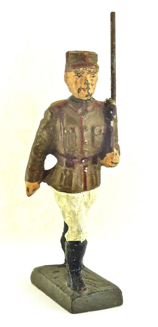 Scarce Lineol Soldier of Luxembourg with Rifle: No cracks with some light wear to include scuffs to front of face. Very good paint quality and uniform detail. 1 Piece. 7.5 cm. Made about 1934-39. Very Good.