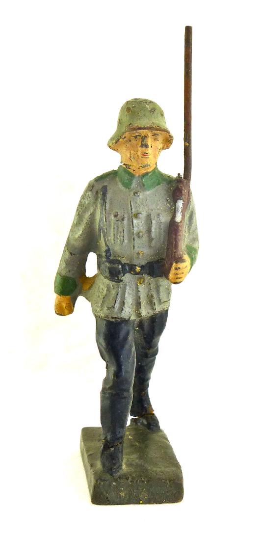 Lineol Scarce Soldier of Finland with Rifle: Neck and boot cracks with some light wear. Very good face, paint and uniform detail. 1 piece. 7.5 cm. Made about 1934-39. Very Scarce. Very Good.