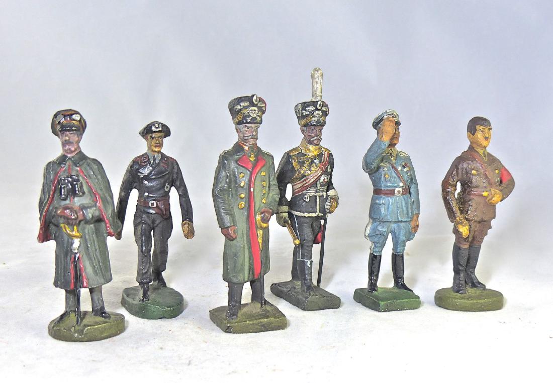 Lineol/ Elastolin Recast of 6 Personality Figures: Made from a material like resin. The weight is about the same as composition Lineol: Goering, Hindenburg, Mackensen. Elastolin: Hitler, Ludendorff, Panzer Driver. Most likely postwar. No cracks but da