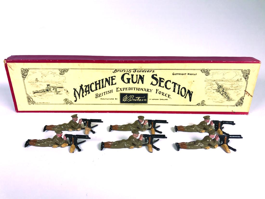 Britains Set #194 Machine Gun Section: in original Whisstock box with tie card. Lying, peak cap, black boots. Pre War. 6 Pieces. Condition Excellent, box Excellent.