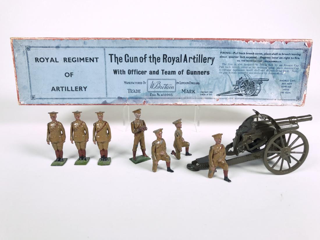 Britains Set #1289 Royal Artillery Gun & Gunners: pre war, in original box, peak caps in light brown uniforms. 8 Pieces. Condition Excellent, box Very Good, with water marks and no tie card.