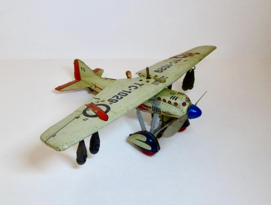 Tin Wind-up Bomber TC-1029 & Composition Pilot (1 of 1)
