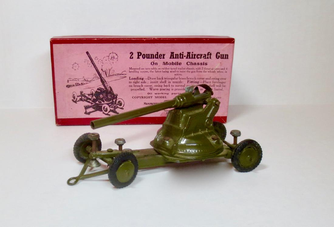 Britains #1717 A.A. Gun on Mobile Chassis: 2 pieces. Post War. Very good condition, with some general surface wear. Box very good.