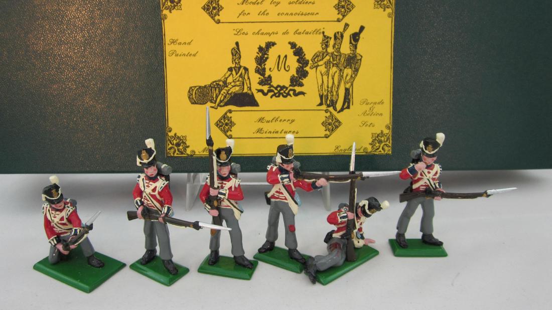 Mulberry Set #BN49 1st Foot Guards in Action: 1st Foot Guards, kneeling & standing at ready, firing, loading, wounded & preparing to fire. 6 pieces. Condition mint in excellent box.