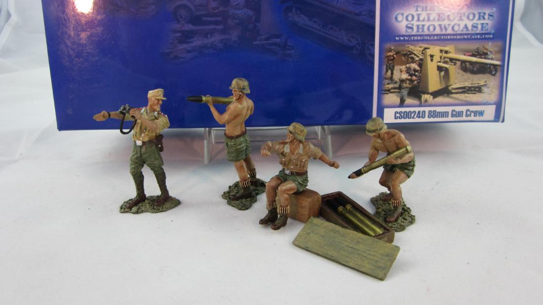 Collectors Showcase #CS240 88 Gun Crew: 4 man crew with ammo box in Afrika Corp uniforms to man Set CS239 88mm Gun. 6 pieces. Condition mint in excellent box