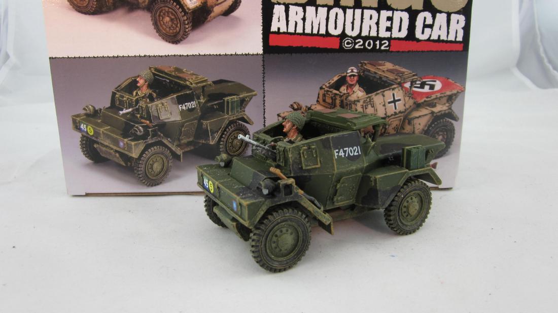 King & Country #DD163 Dingo Armored Car: British Dingo Armored Car with driver & bren gun. 1 piece. Condition mint in excellent box.