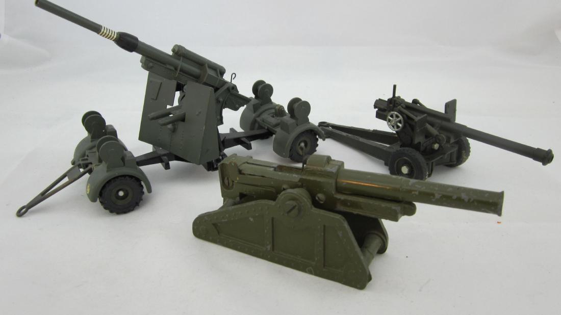 Dinky, Solido & Bullock Cannon Assortment: Dinky German 88mm mobile cannon, Solido Howitzer, & Bullock garrison gun. 3 pieces. Condition excellent to Dinky, very good to Solido & Bullock guns..