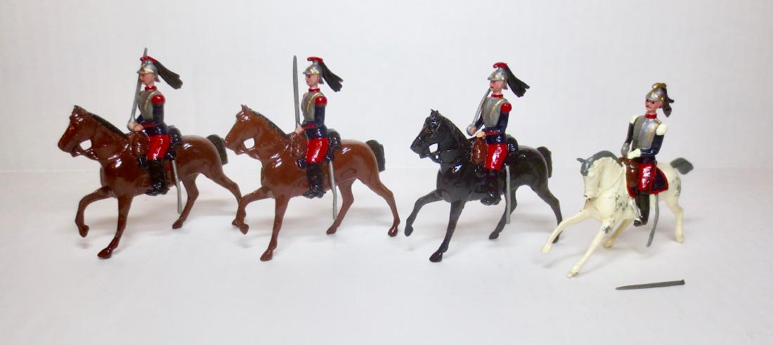 Britains Set #9266 French Cuirassiers: 4 pieces. Post-war. Very good to fair condition, with officer's sword broken but included. No box.