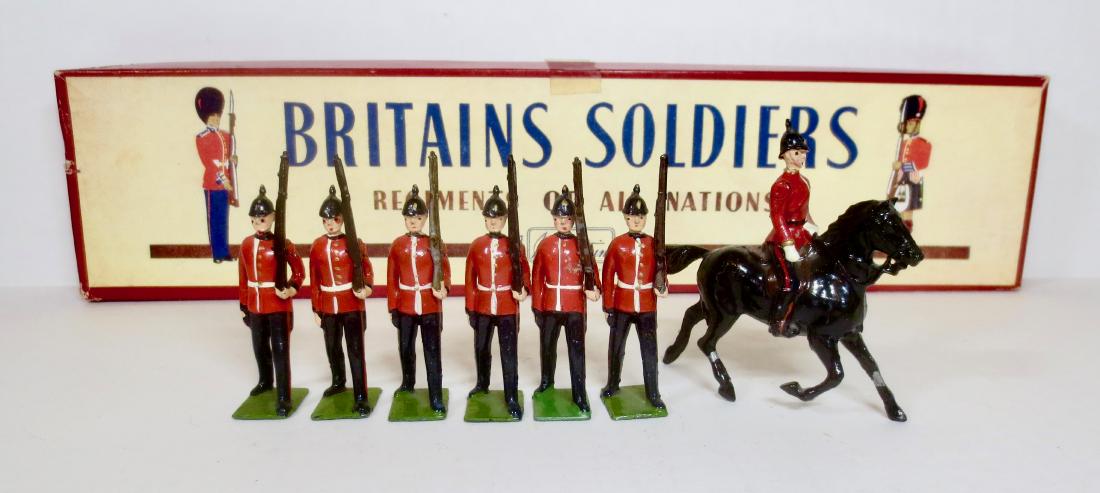 Britains Set #36 The Royal Sussex Regiment: With Mounted Officer. 7 pieces. Post-war in ROAN box. Very good condition (1 mismatched base). Box very good.