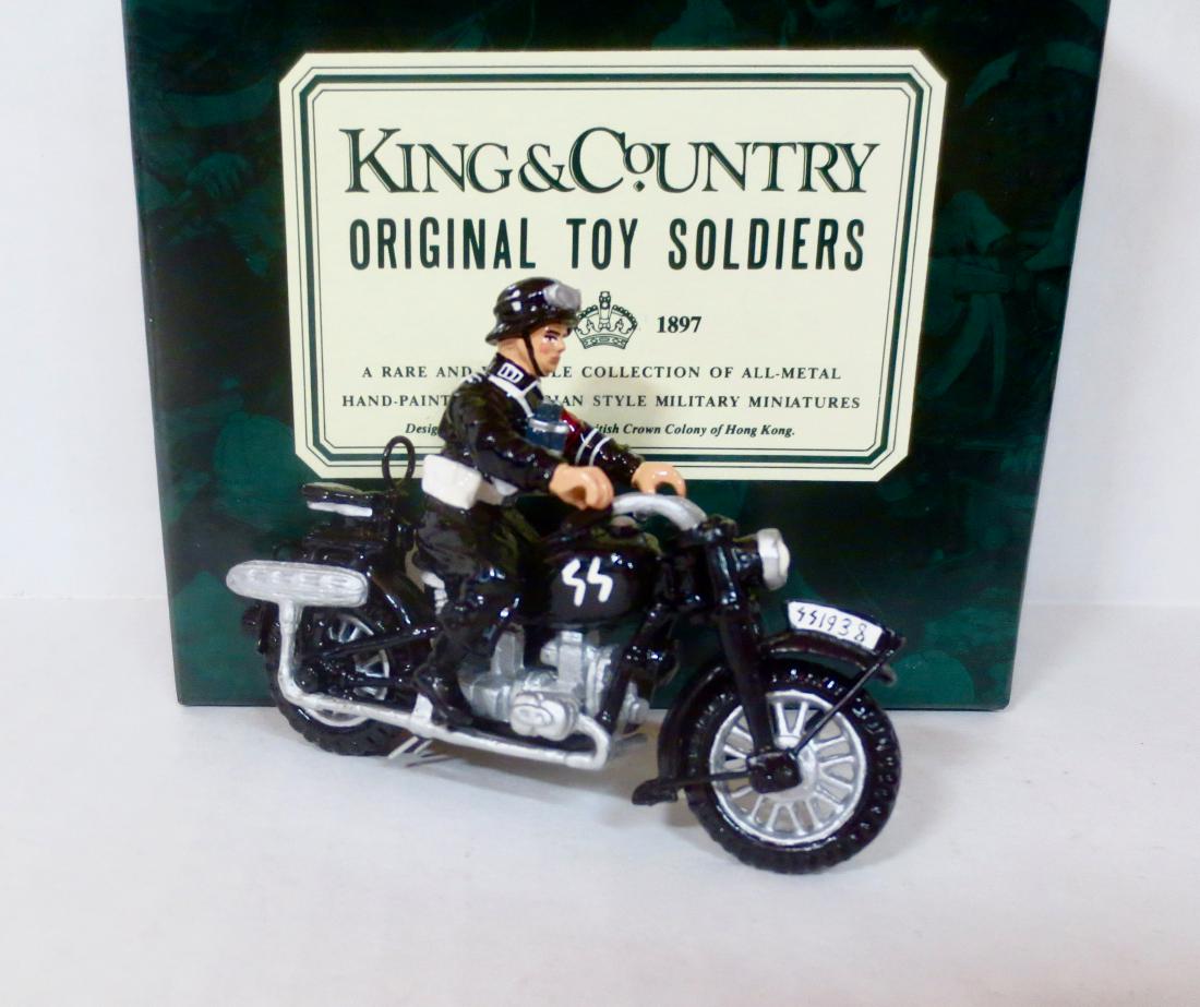 King & Country WW2 German Motorcycle: 3 pieces. Good condition (bike does not stand on its own, and rifle loose from rider). Comes in a blank K&C box.