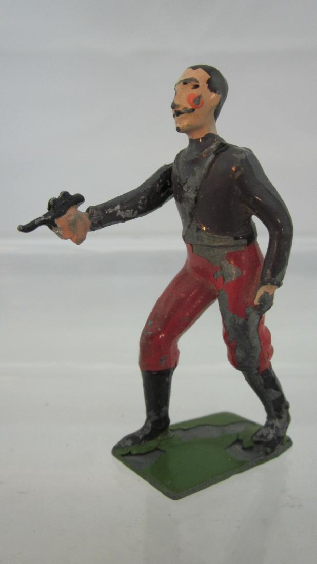 Britains #1415 Buck Rogers Series Killer Kane.: Buck's arch-enemy Killer Kane with raygun. 1 piece. Condition good, paint loss to left side, replaced & matched right arm, green base. Only 1935.