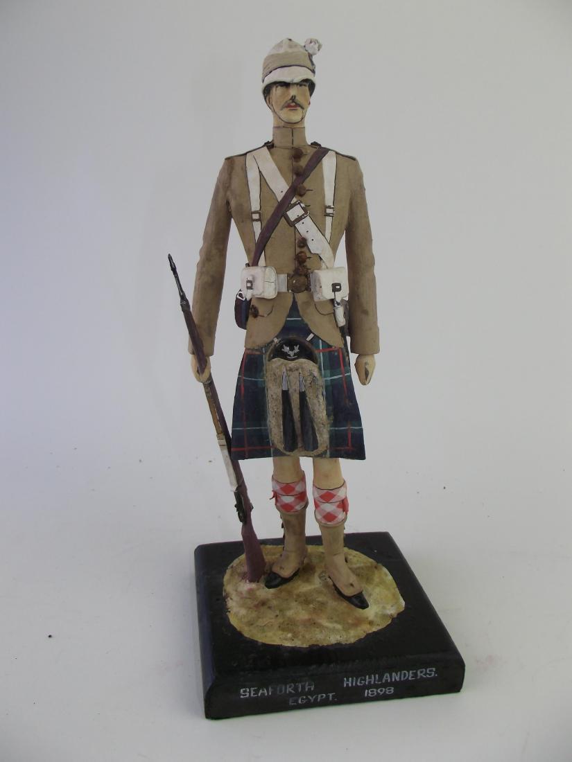 Wood Hand Carved & Painted Highlander (1 of 2)