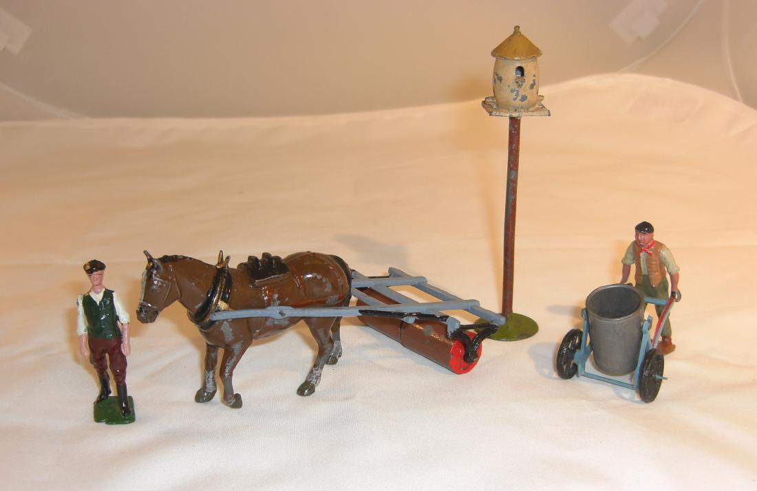 Britains Farm: #9F man with horse & roller; #575 dove cote; #564 man with swing water barrow; 7 pieces total; condition good