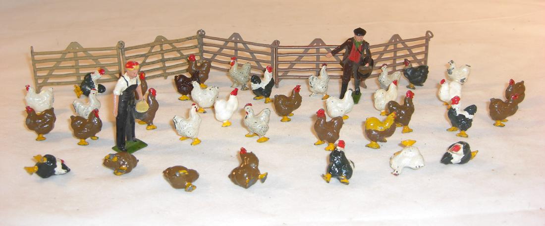 Britains Farm: #744 Farmhand sowing seed; #747 Girl with bucket; 36 x # 516 Fowl (7-8 decided not to stand); 5 x #527 Hurdle; 43 total pieces; condition excellent