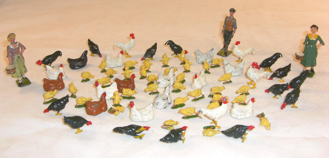 Britains Farm: 2 X #532 Milkmaid carrying Pail; #563 Stable Lad (some chips); 50+ pieces from #516 Fowl, #544 Chicks, $545 Hen Sitting, and #660 Prize Poultry, Feeding; 50+ pieces; condition very good