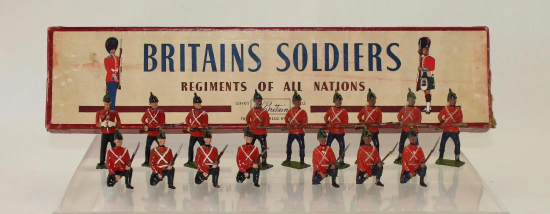Britains From Set #17 Somerset Light Infantry: Lot includes Pre War 6 standing, 3 kneeling and Post War 1 officer, 2 standing and 4 kneeling with ROAN box. 16 pieces. Some figures mismatched. Good condition with one rifle broken. Box good with scu
