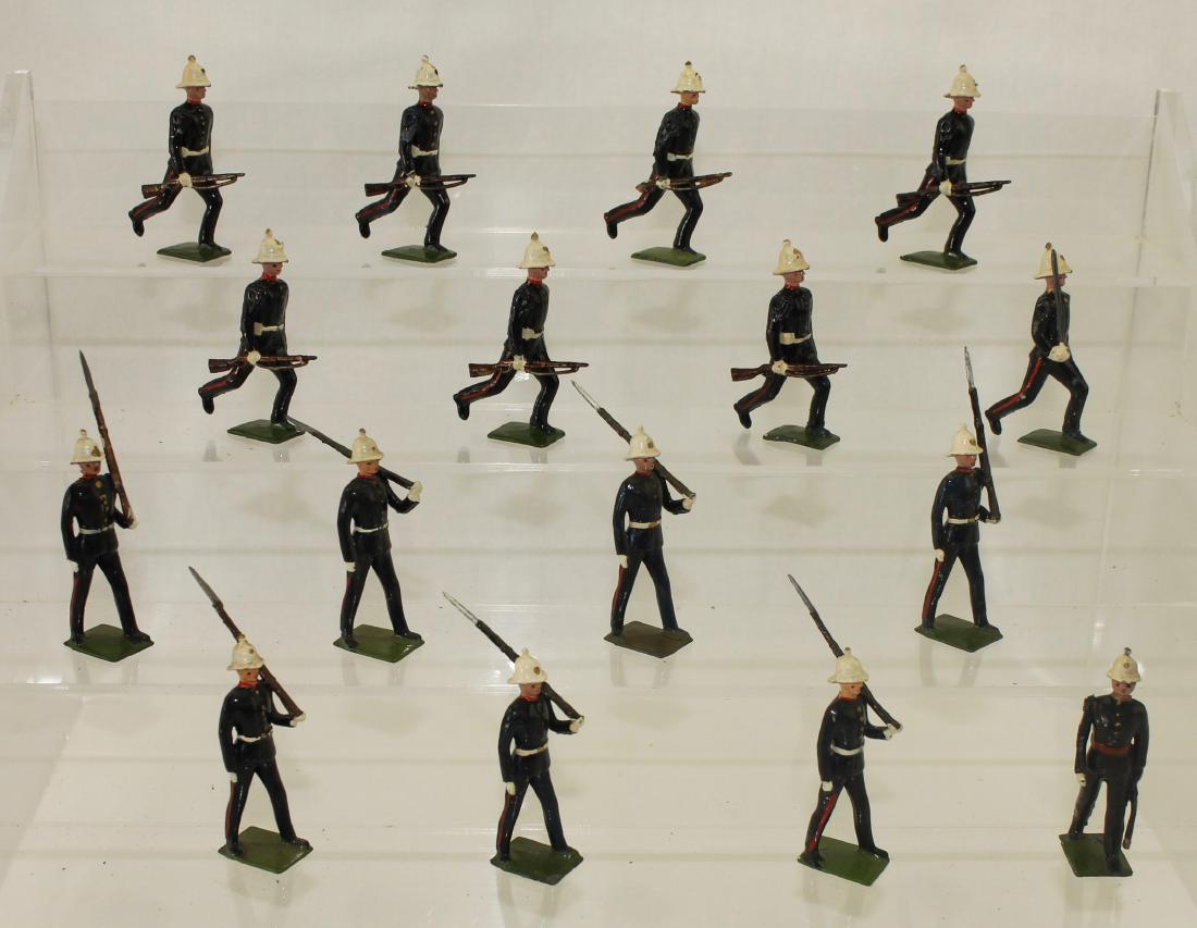 Britains From Set #1284 Royal Marines: Lot includes Post War 7 troopers marching at slope with officer and 7 troopers running at the trail with officer. 16 pieces. Slight mismatch paint on some figures. Condition good with running officer 