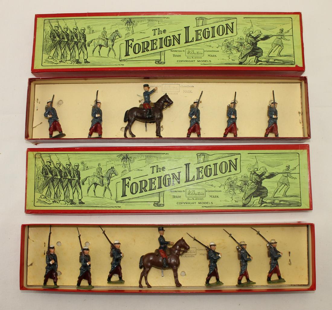Britains From Set #1711 French Foreign Legion: Lot includes Post War 11 troopers marching at the slope with 2 mounted officers and 2 boxes. Mismatched paint. 13 pieces. Condition good to very good, 5 bayonets missing. Boxes good with one mismatche