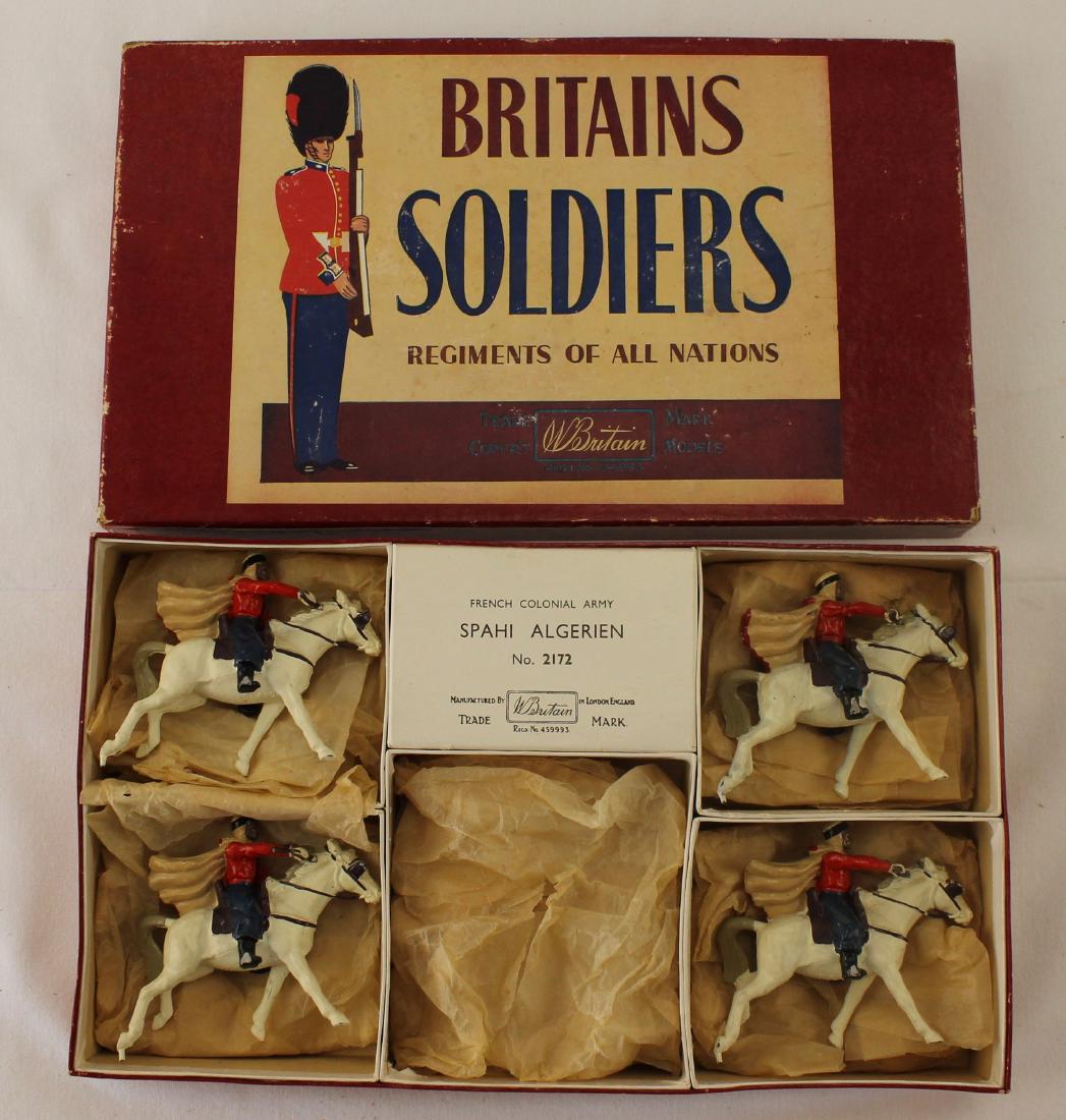 Britains From Set #2172 Algerian Spahis: Lot includes 4 mounted Spahis in special partitioned box - lacks mounted flag bearer. Made 1958-60 Only. 4 pieces. Condition very good plus with damage. 3 figures have rifle butts broken with one piec